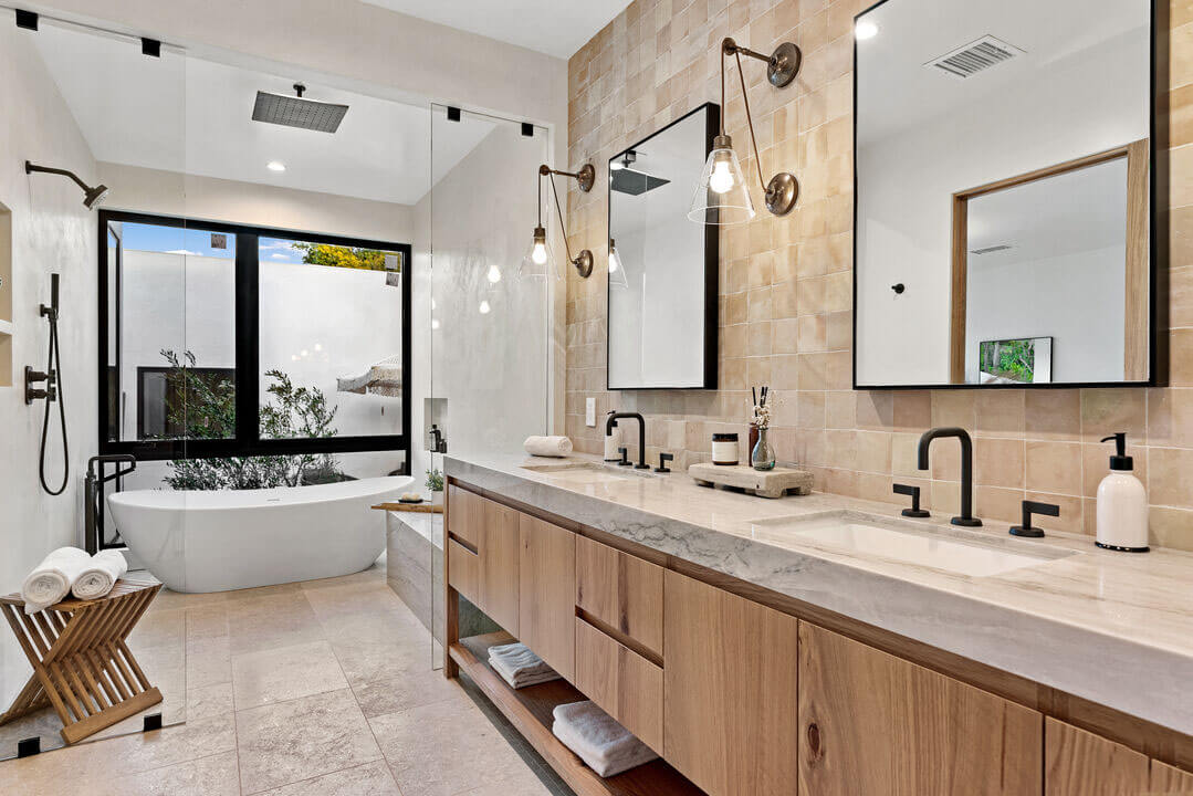 Contemporary bathroom with wood cabinets designed by an Orange County architect