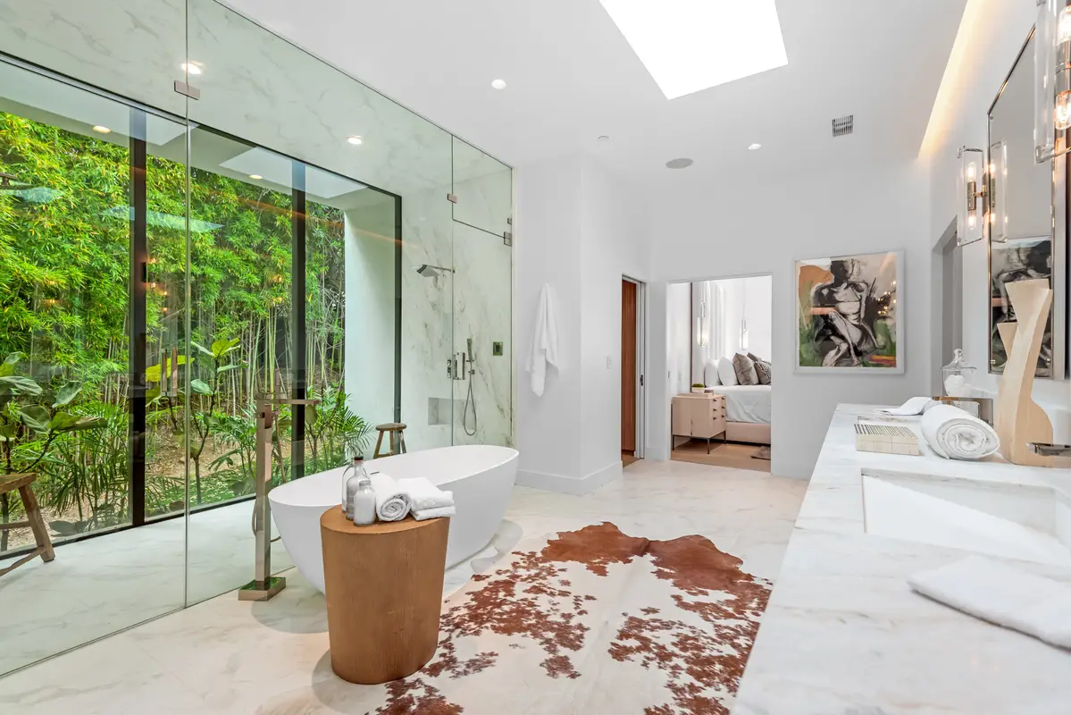 Contemporary master bathroom with glass shower enclosure