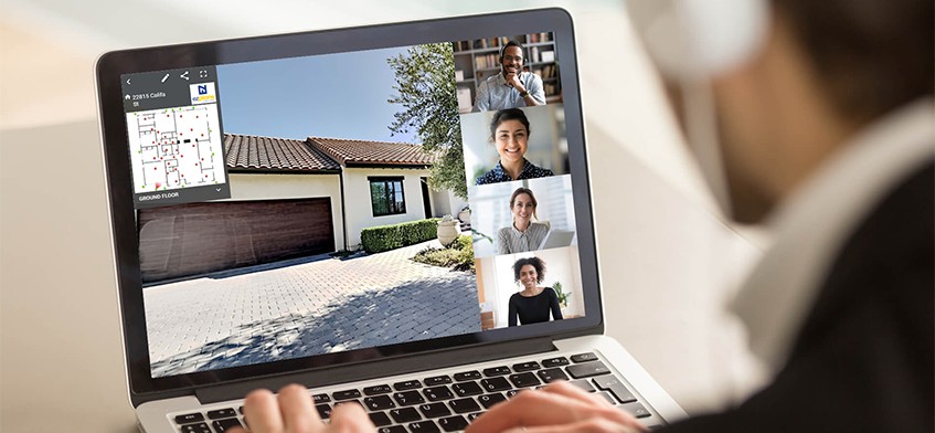 A person meeting via laptop for architecture services