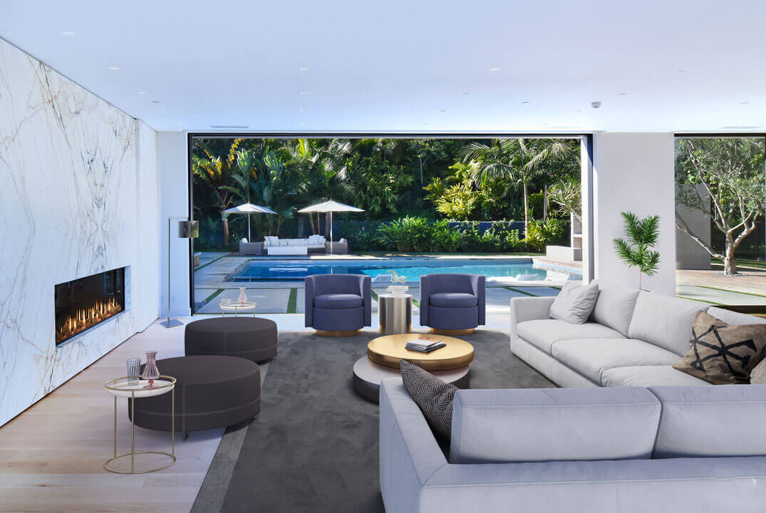 Modern living area with huge opening to the pool area