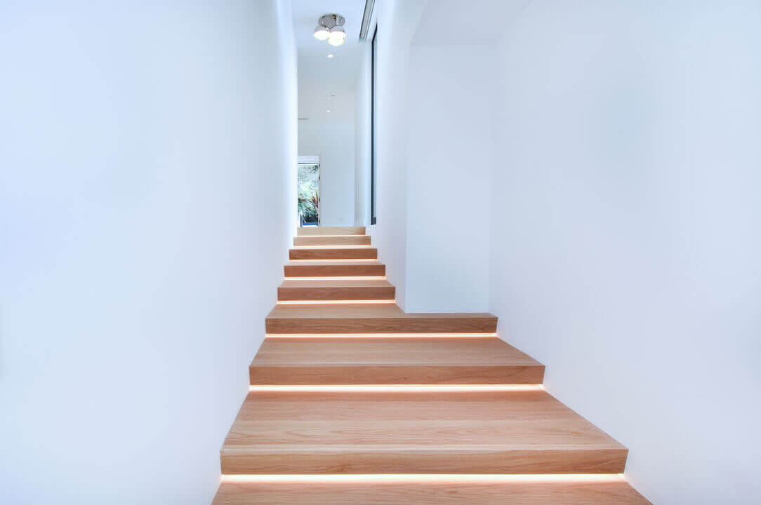 Wooden stairway with lighting
