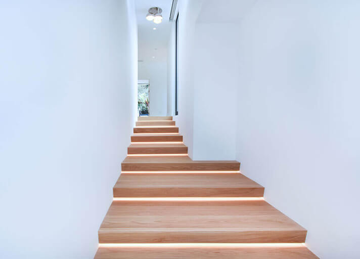 Wooden stairway with lighting