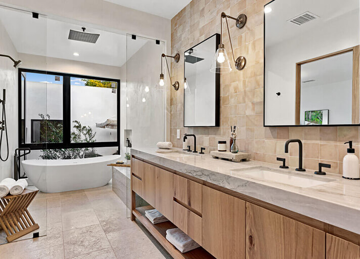 Master bathroom with large windows and free standing tub