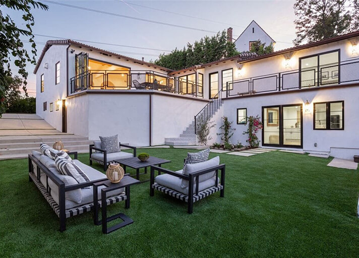 Garden seating area with view of the house