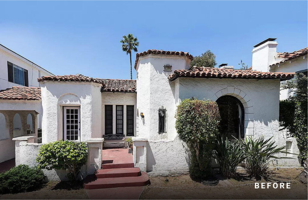 White, outdated Spanish-style home