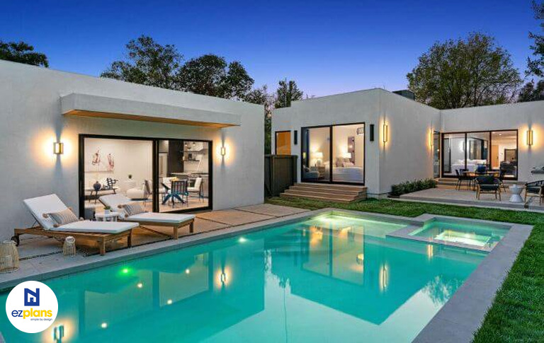 New contemporary home and ADU next to resort-style pool designed by EZ Plans Architects.